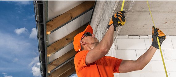 Contractors finishing a commercial concrete floor